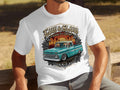 White t-shirt with graphic of vintage teal Chevrolet truck and text 