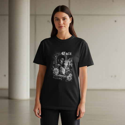 Black t-shirt with a black and white graphic featuring a woman and a car.