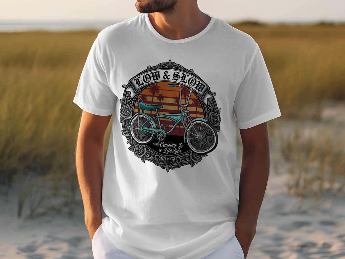 White t-shirt with graphic of a blue lowrider bicycle and text "Low & Slow Cruising Is a Lifestyle".