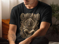Black t-shirt featuring a central ornate circular design with a warrior and a woman.