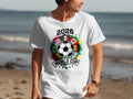 White t-shirt with 2026 World Cup logo featuring flags and stars.
