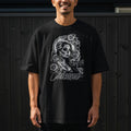 Black t-shirt with a Day of the Dead skull and roses design.