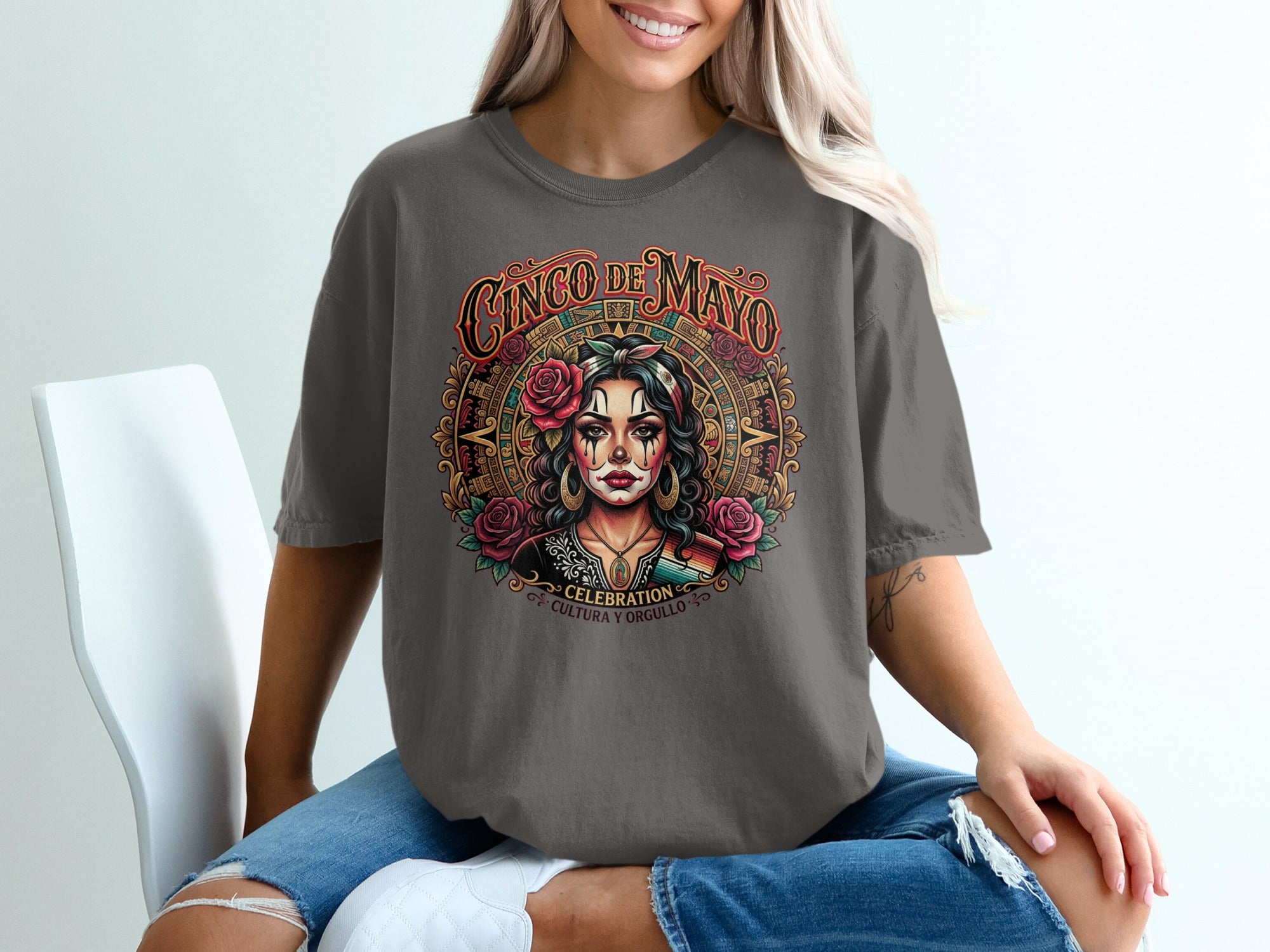 Cinco de Mayo graphic tee with woman and floral skull design.