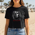 Black crop top with a skull and woman's face graphic, and 