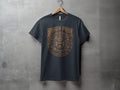 Dark t-shirt with a bronze Aztec sun calendar graphic.