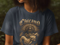 Chicano t-shirt featuring a warrior carrying a woman with a feathered headdress.