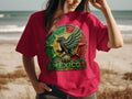 Crimson t-shirt featuring a circular Aztec-inspired eagle emblem with 