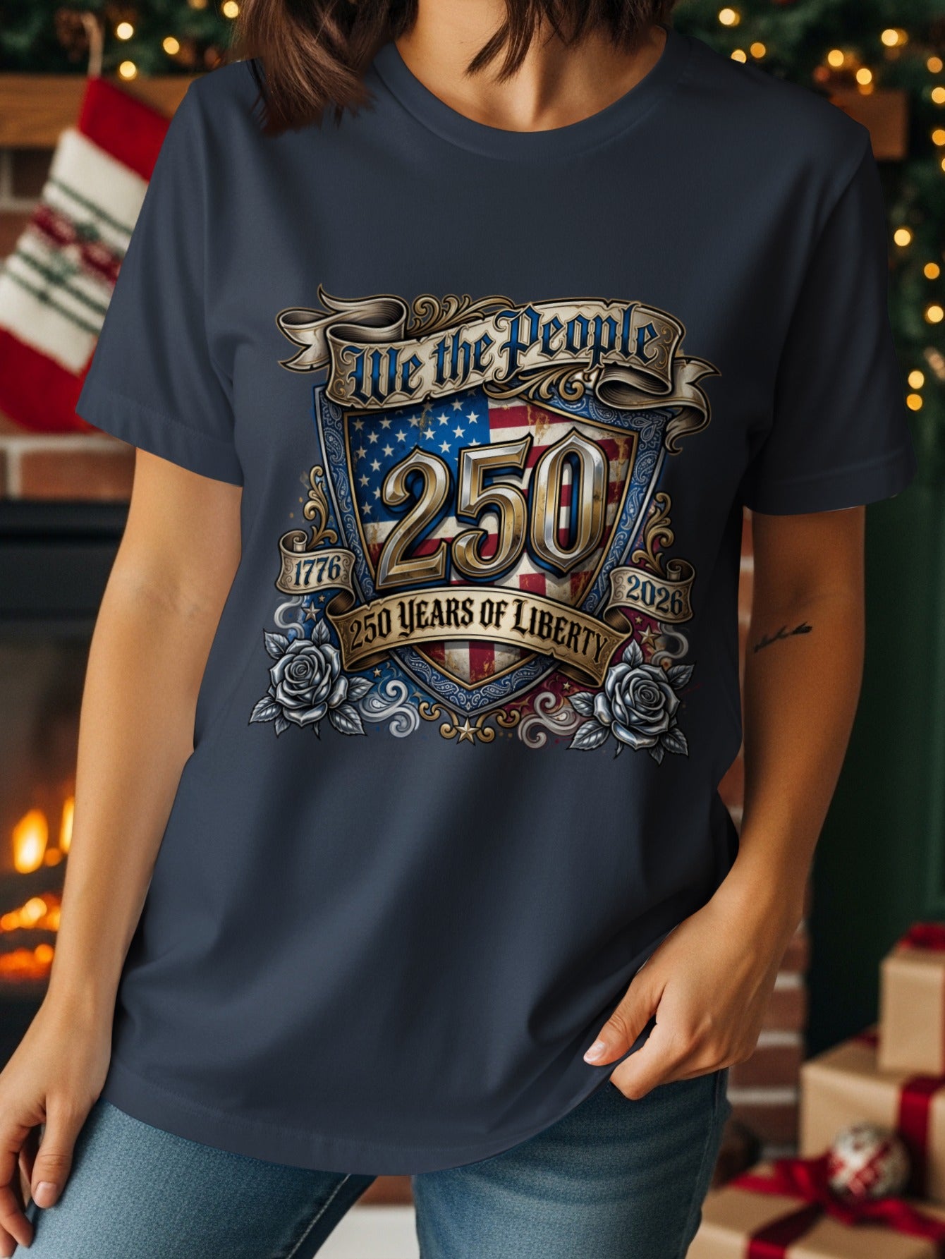 Navy t-shirt with "We the People 250 Years of Liberty" patriotic graphic.