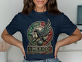 Navy t-shirt with a circular Mexican eagle and serpent emblem and 