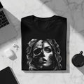 Black t-shirt featuring a skull and face design with roses.