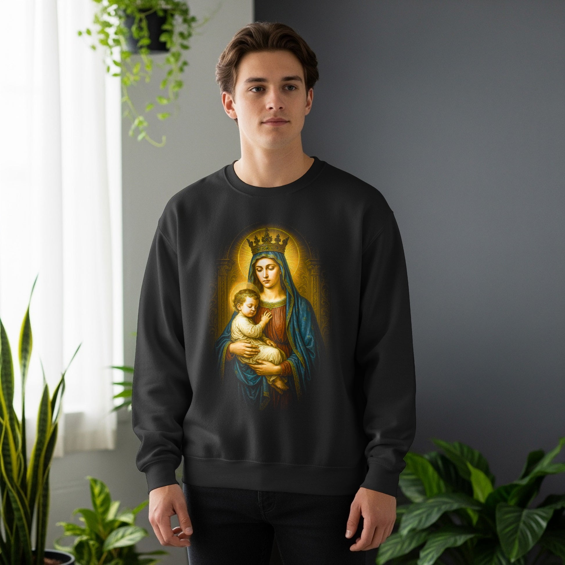 Man wearing black sweatshirt with Madonna and child Jesus print.