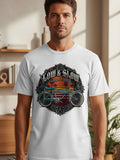 Graphic t-shirt with lowrider bicycle, sunset, and roses design.
