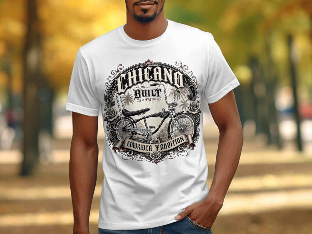 White t-shirt with "Chicano Built" and a lowrider bicycle graphic.