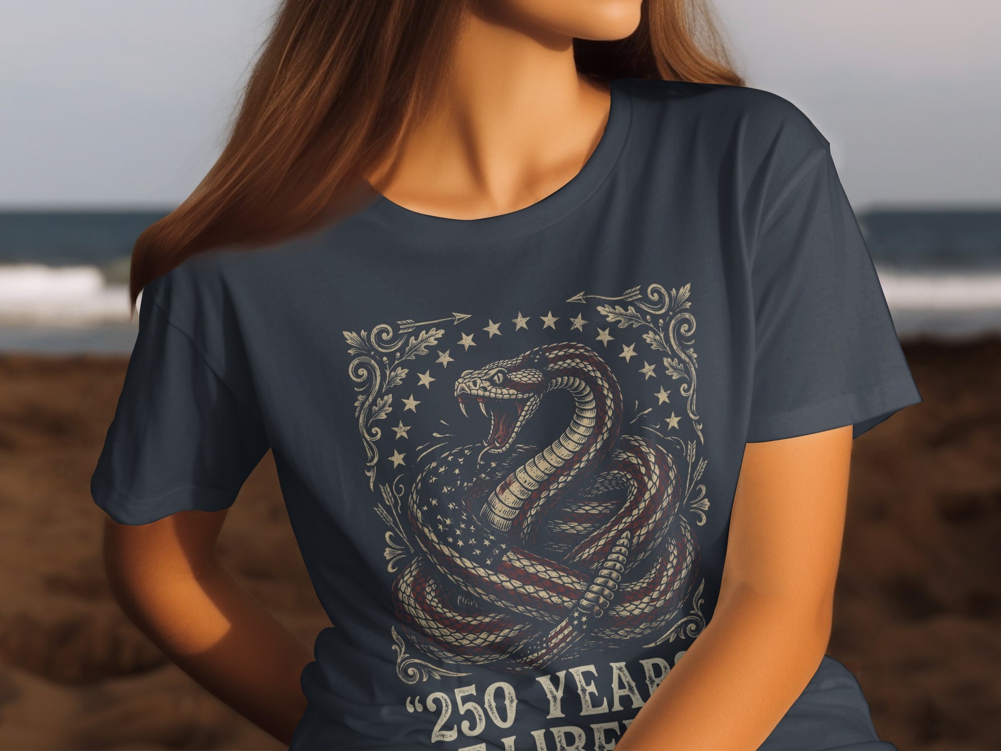 T-shirt with coiled snake on US flag and "250 Years" text.