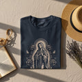 Dark blue t-shirt with a graphic of the Virgin Mary surrounded by roses.