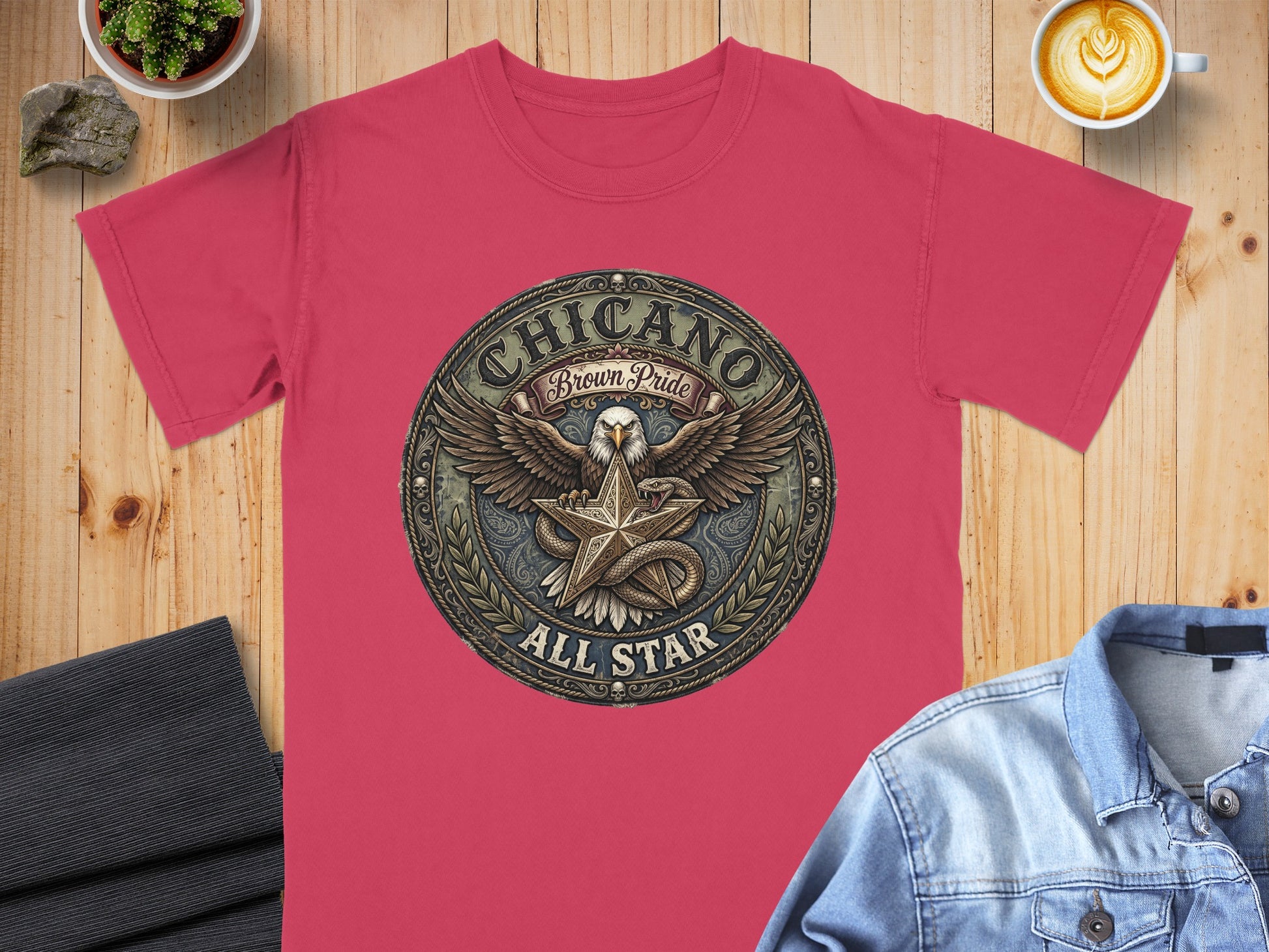 Red t-shirt with a "Chicano Brown Pride All Star" circular emblem.