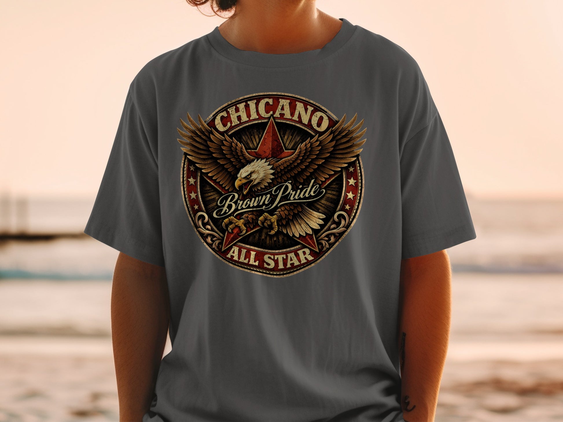 T-shirt with circular design featuring eagle, stars, and "Chicano Brown Pride All Star".