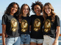 Four women in black t-shirts featuring an image of Jesus praying.