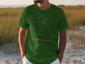 Green t-shirt with 2025 USA-Canada-Mexico trophy logo.