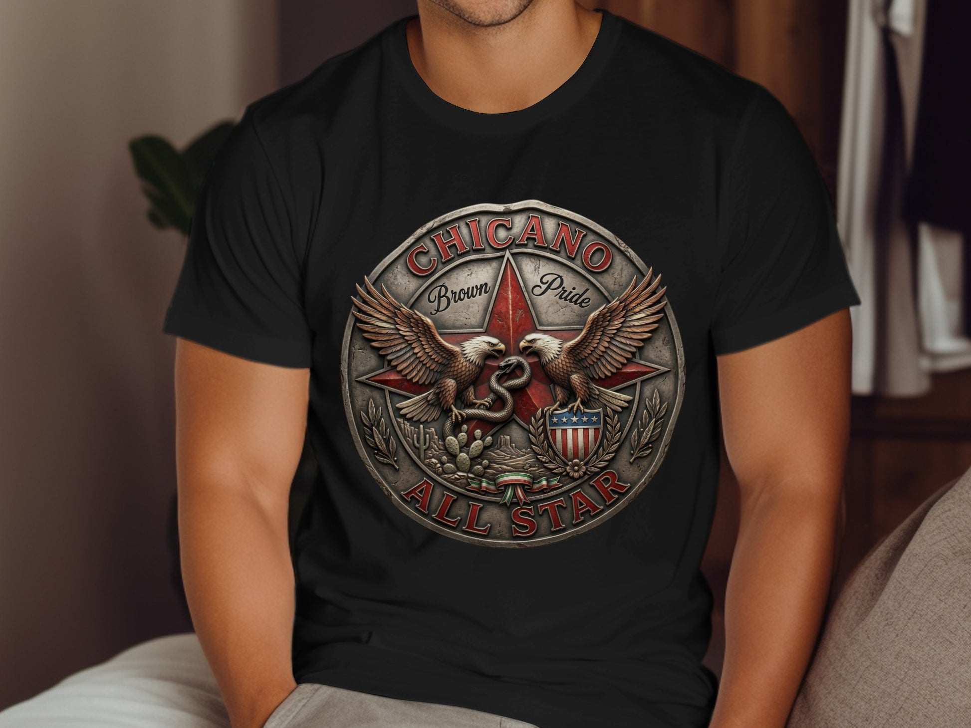 Black t-shirt featuring a circular emblem with eagles, snake, and "Chicano Brown Pride All Star" text.