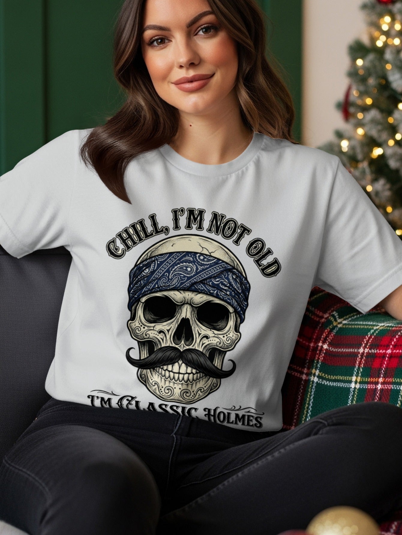 White t-shirt with skull wearing bandana and mustache, text "Chill, I'm not old I'm Classic Holmes."