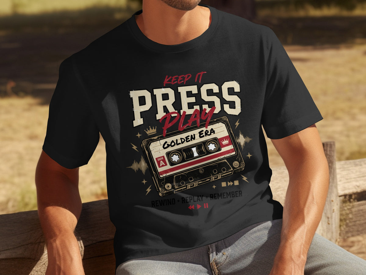 Black t-shirt with "Keep It Press Play Golden Era" and cassette tape graphic.