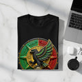 Black t-shirt with colorful eagle emblem on a marble surface.
