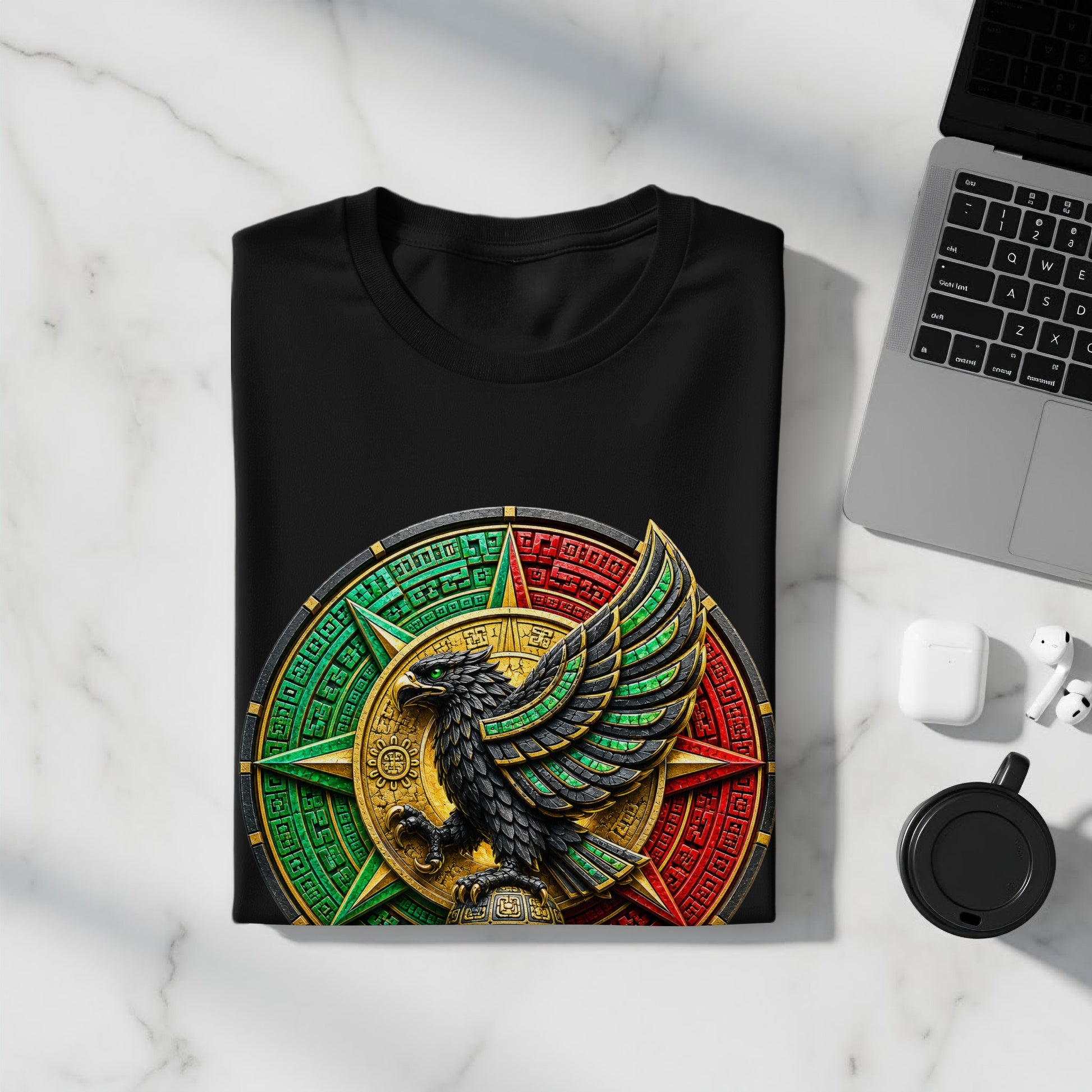 Black t-shirt with colorful eagle emblem on a marble surface.