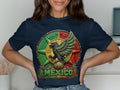 Dark blue t-shirt with a circular Mexican emblem featuring an eagle on a globe.
