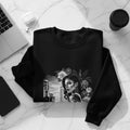 Black sweatshirt featuring a woman with flowers and city skyline graphic.