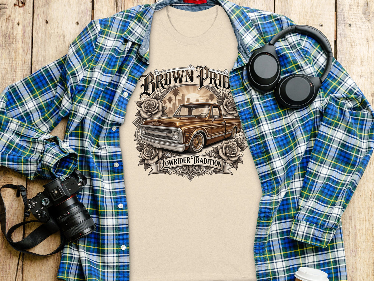 T-shirt with "Brown Pride Lowrider Tradition" graphic featuring a truck and roses.