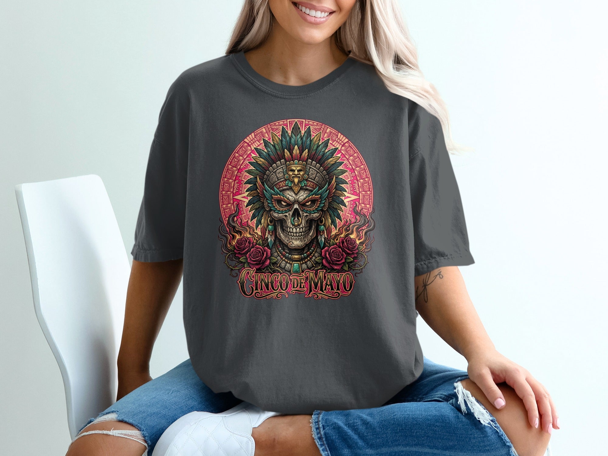 Dark grey t-shirt with a skull, headdress, and roses design for Cinco de Mayo.