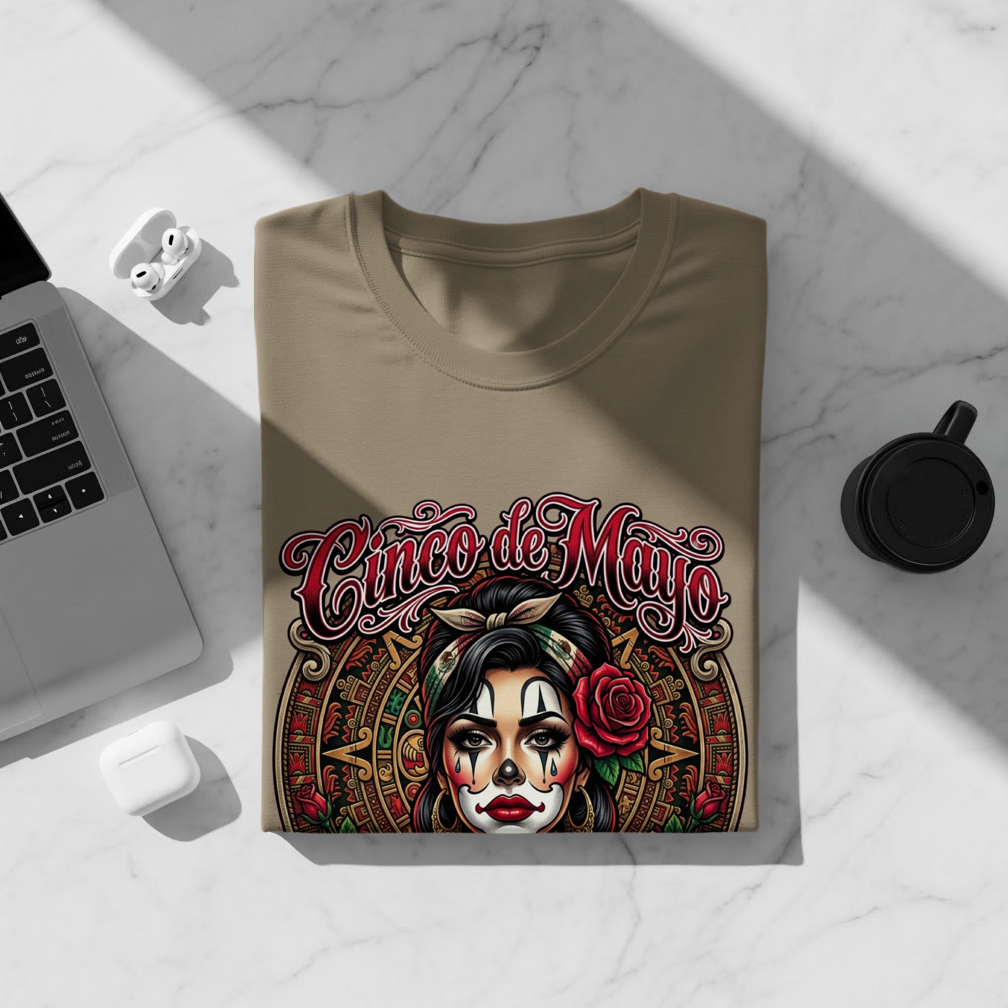 T-shirt with "Cinco de Mayo" text and a woman's face with face paint.