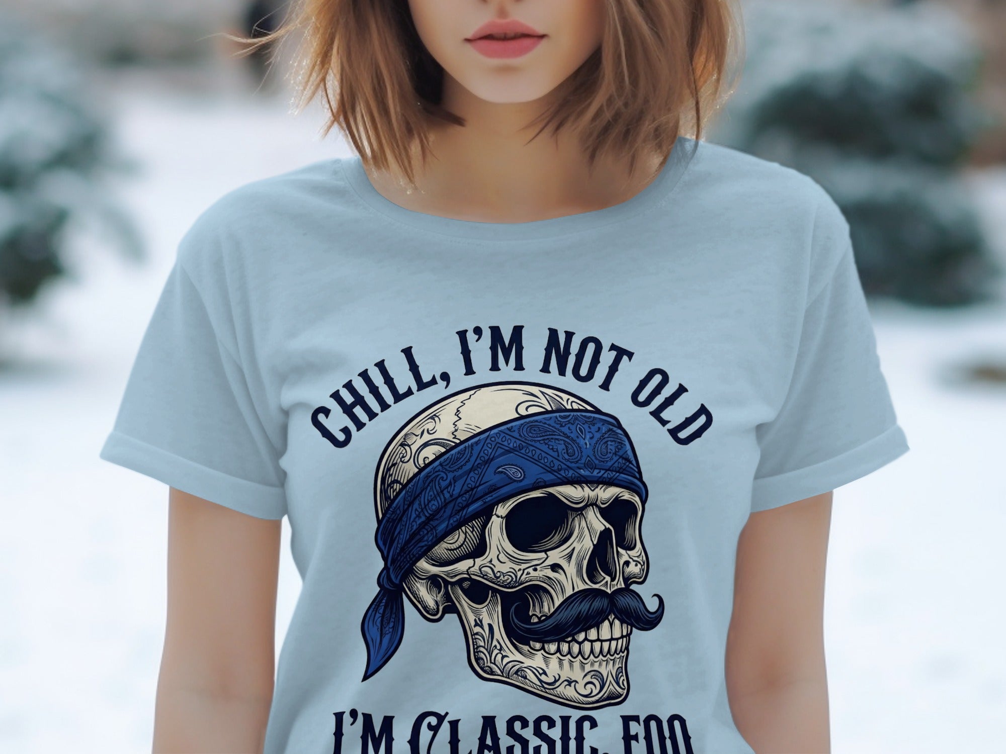 Light blue t-shirt with skull graphic and "Chill, I'm Not Old" text.