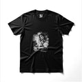 Black t-shirt with a vintage illustration of a woman and a classic car.