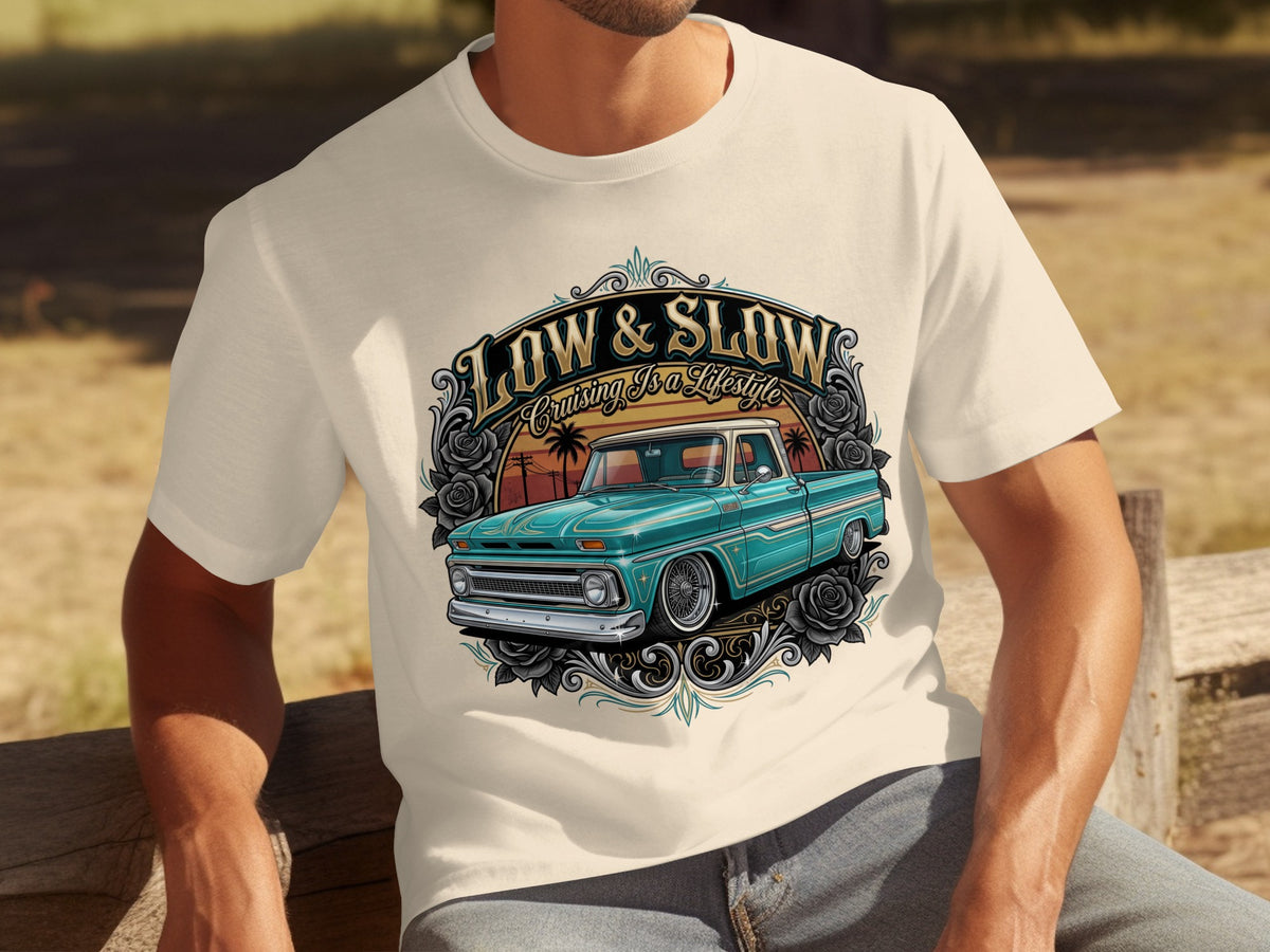 Cream t-shirt with graphic of teal lowrider truck and text "LOW & SLOW Cruising Is A Lifestyle".