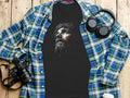 Black t-shirt with a depiction of Jesus Christ wearing a crown of thorns.