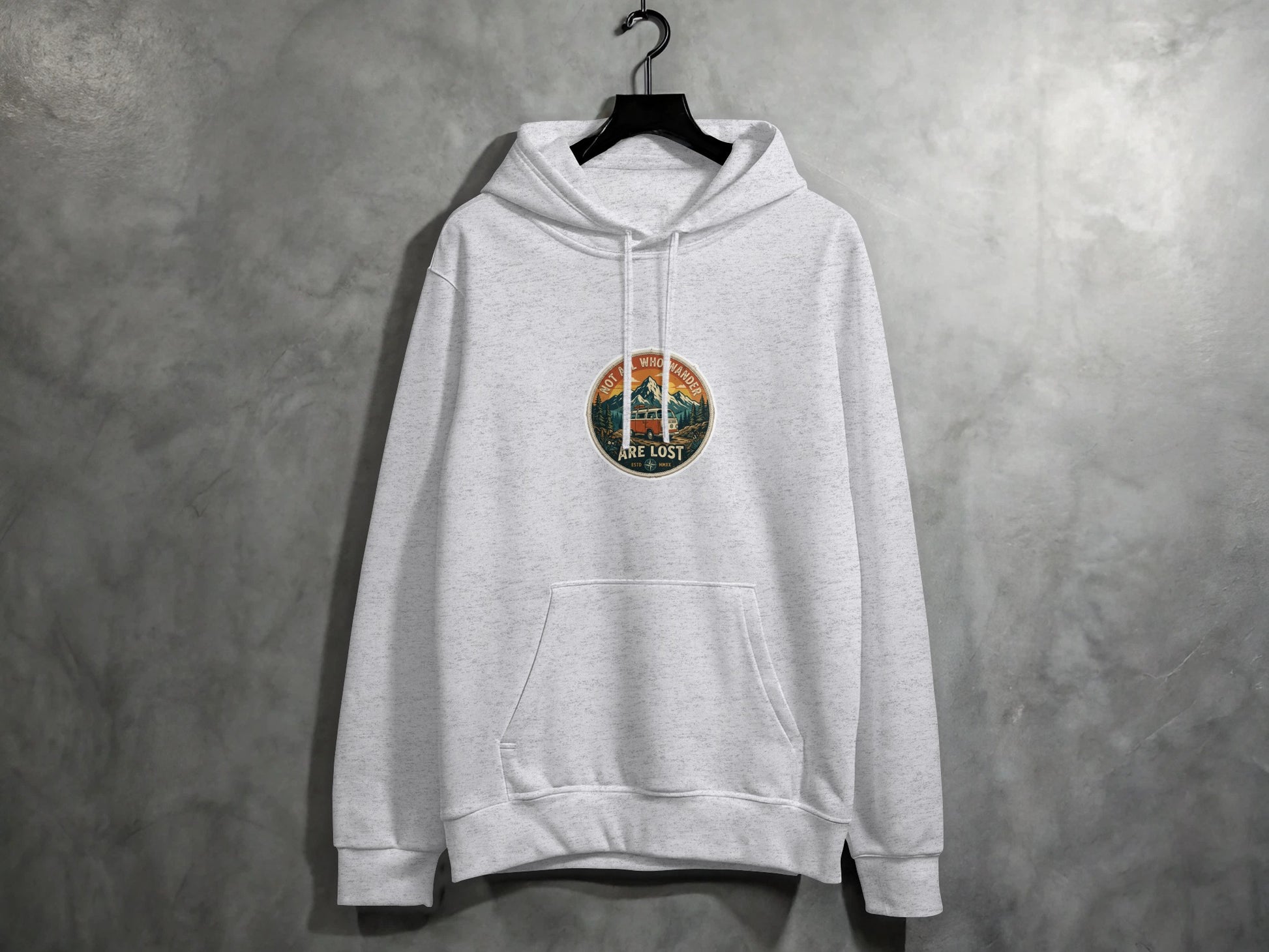 Gray hoodie with "Not all who wander are lost" graphic on chest.