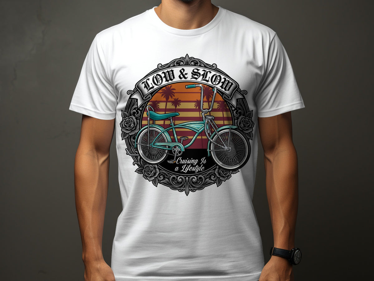 White t-shirt featuring "Low & Slow" text and a turquoise lowrider bicycle graphic.