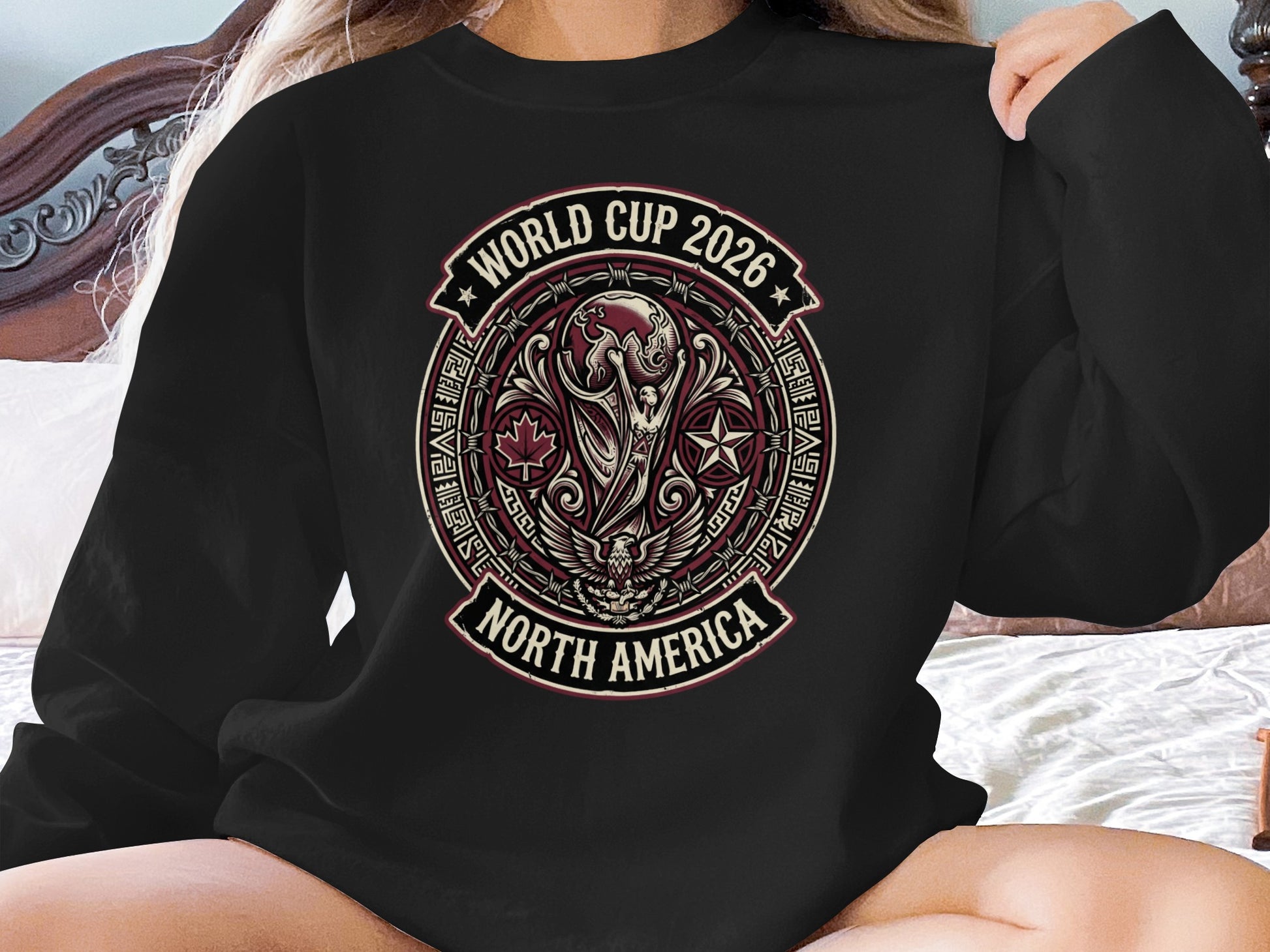 World Cup 2026 North America crest with FIFA logo on black sweatshirt.