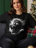 T-shirt with a grayscale depiction of Jesus Christ on the cross.