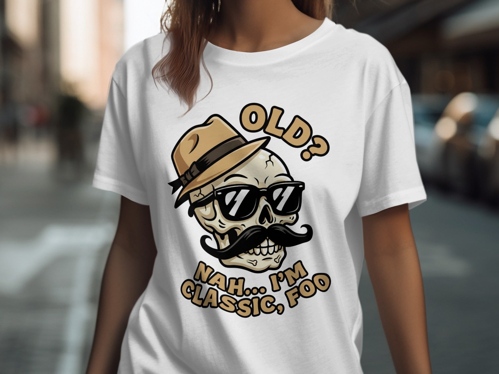 T-shirt featuring a skull with a hat, sunglasses, and mustache, saying "OLD? NAH, I'M CLASSIC, FOO."