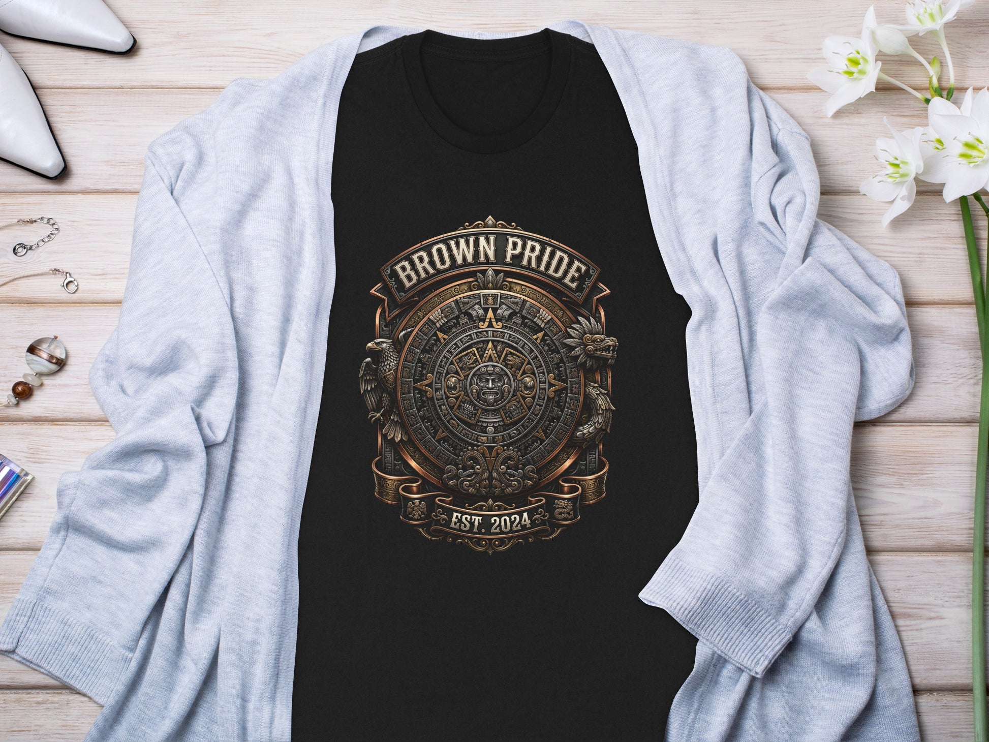 Black t-shirt with "Brown Pride" crest and "EST. 2024" text.