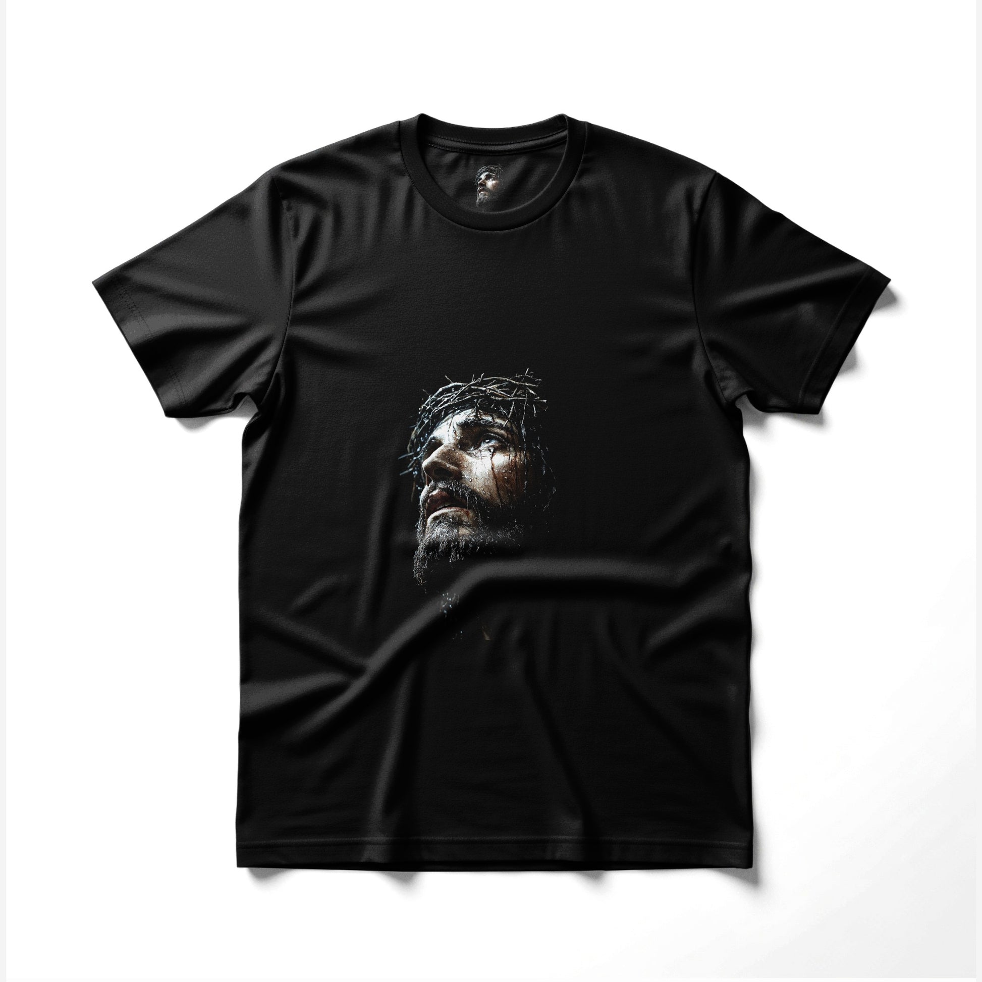 Black t-shirt with realistic illustration of Jesus Christ's face with crown of thorns.