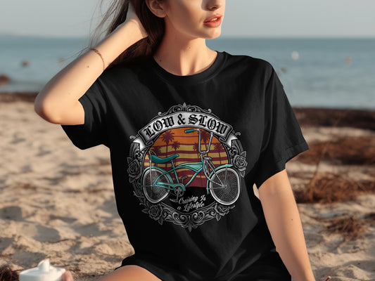 Black t-shirt with vintage bicycle graphic and text "Low & Slow Cruising Is a Lifestyle".