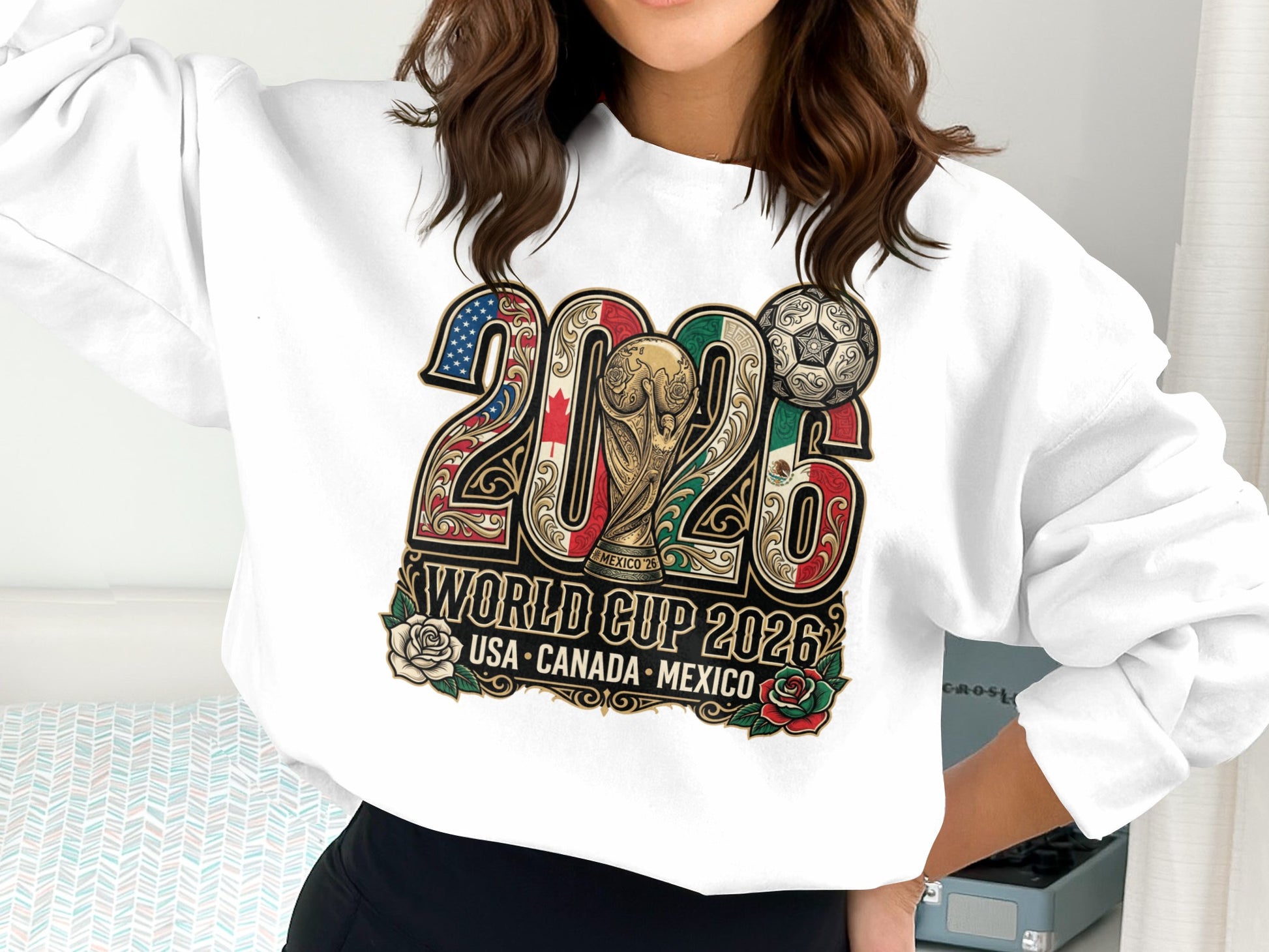 2026 FIFA World Cup USA, Canada, Mexico graphic on a white sweatshirt.