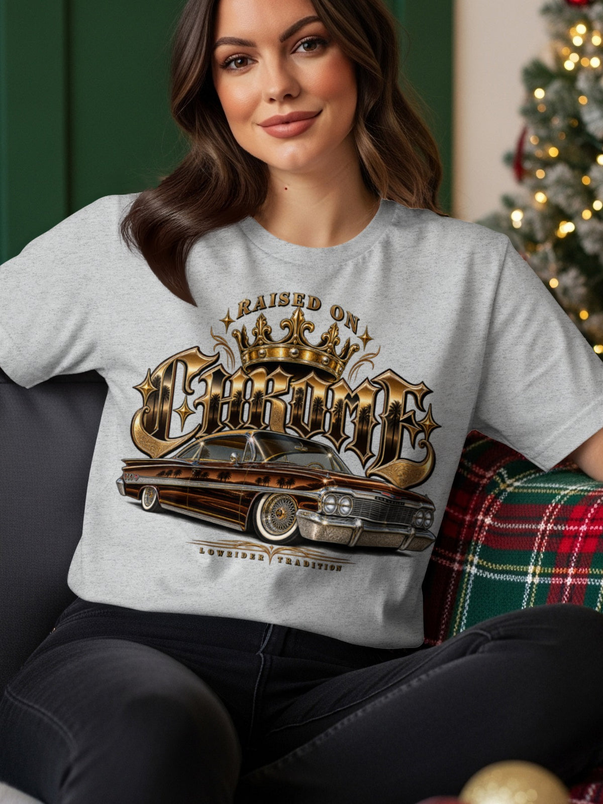 Grey t-shirt with gold lettering "Raised on Chrome" and a lowrider car.