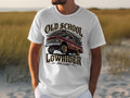 White t-shirt with red lowrider truck graphic and text 