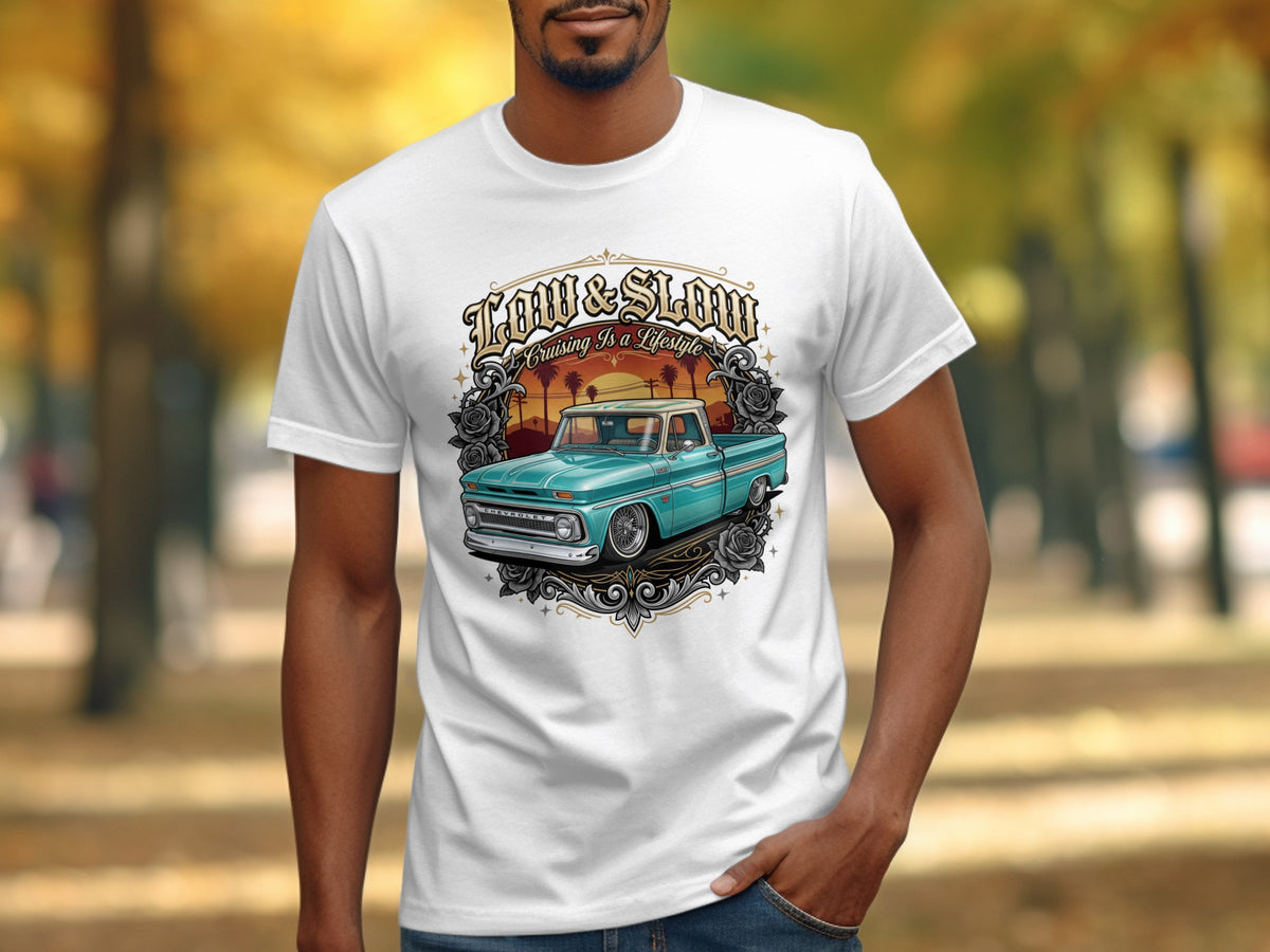 White t-shirt featuring a teal classic pickup truck with text "Low & Slow".