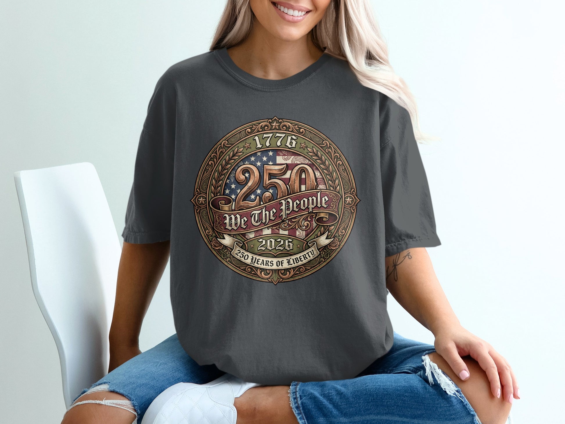 Dark t-shirt with "1776 250 We The People 2026 250 Years of Liberty" emblem.